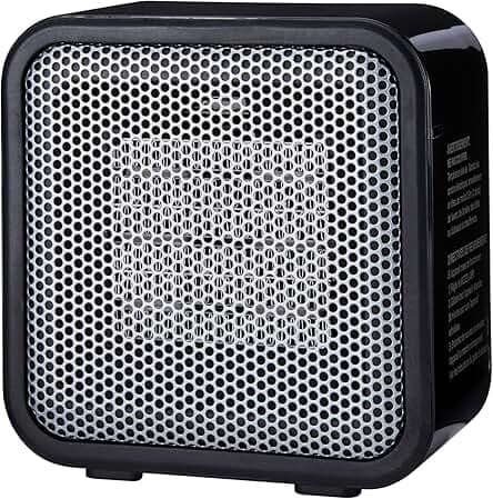 Amazon Basics Ceramic Space Heater, Mini Heater for Office Desk, Portable Tent Heater for Camping (Indoor Use), 500 W, With Tip-Over Protection, Lightweight (1.4 LBS), Black, 5.8"D x 3.4"W x 6"H